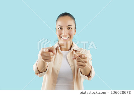 Happy choosing you gesture attractive woman in casual wear, cheerful friendly warmly pointing 136028678