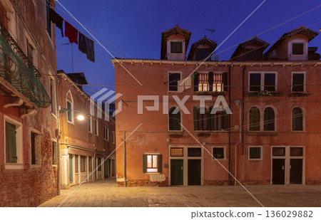 Evening Street with Laundry and Old Houses in Venice Evening Street with Laundry and Old Houses in Venice 136029882