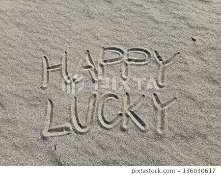 Characters written on the beach 136030617