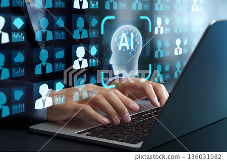 AI-powered recruitment and automated screening. Resume analysis and talent analytics tools. Candidates on laptop. 136031082