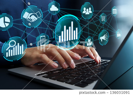 Data analysis and business intelligence. Data integration and data mining. Using a laptop. 136031091