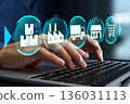 Supply chain management. Supplier management and transportation visibility. Use a laptop to manage production planning. 136031113