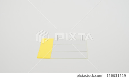 A low-angle photo of a glass slide placed in the center of the bottom row on a white background 136031319