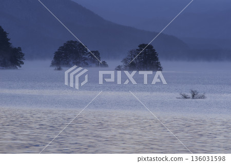 Morning landscape shrouded in fog Morning landscape shrouded in fog 136031598