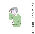 Illustration material of an elderly woman holding her head due to a headache 136032314