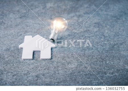House using light energy bulb for real estate home family property, lightbulb concept for mortgage broker knowledge helps save on electric power bills and green energy efficiency 136032755