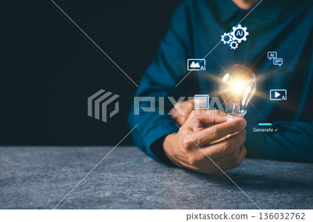Hand holding glowing lightbulb for idea innovation moment in business background, artificial intelligence icons floating around glass bulb signify digital inspiration power concept 136032762