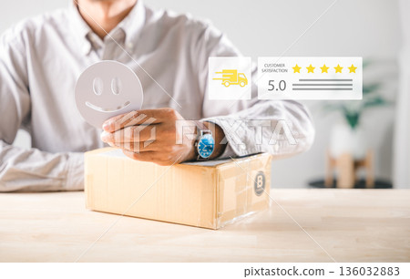 Satisfaction customer experience with online shopping delivery box, person holding happy face icon shows excellent service feedback, high rating review building brand reputation 136032883
