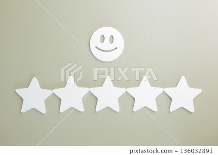 Five star review showing customer feedback, satisfaction, and positive online rating for business service, happy smiley face emphasizing excellent client experience from survey Five star review showing customer feedback, satisfaction, and positive online rating for business service, happy smiley face emphasizing excellent client experience from survey 136032891