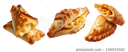 Flaky filled puff pastries pocket with melted cheese oozing out, isolated on white background, concept of Brazil snack Flaky filled puff pastries pocket with melted cheese oozing out, isolated on white background, concept of Brazil snack 136035082