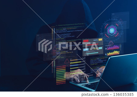 Hacker in hoodie using laptop with digital code, data errors, and cyber attack interface, representing cybersecurity breach, hacking, and online data protection concept. 136035385