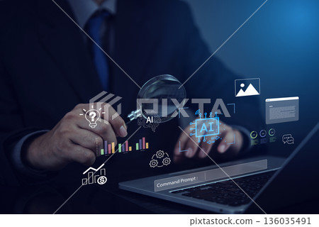 Businessman holds magnifying glass data analysis and artificial intelligence icons, with laptop command prompt. searching for insights.concept innovation, digital transformation, future technology. 136035491