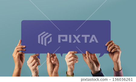 Group of hands holding colorful Speech Bubble together. Concept of diversity 136036261