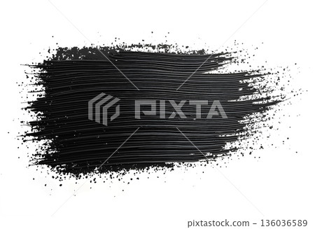 Black paint stroke creates a dramatic texture on a white background, highlighting the contrast and artistic possibilities 136036589