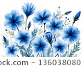 Beautiful blue floral arrangement with delicate blossoms and green foliage featuring various shades and textures 136038080