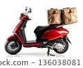 Delivery scooter with insulated bags parked in a well-lit area ready for food transportation 136038081