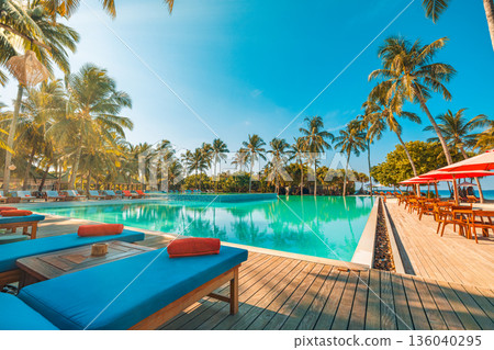 Panoramic sunset luxury beach resort infinity pool palm trees sun loungers turquoise water happy summer relaxation paradise Panoramic sunset luxury beach resort infinity pool palm trees sun loungers turquoise water happy summer relaxation paradise 136040295