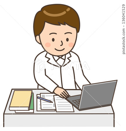 A smiling male doctor working at a desk in front of a computer A smiling male doctor working at a desk in front of a computer 136041529