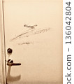 Toilet and graffitied door 136042804