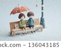 A gentle moment between two people on a bench sharing an umbrella on a rainy day 136043185