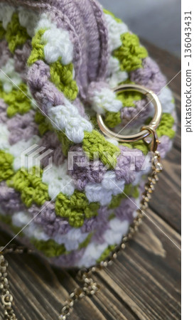 A colorful knitted fabric texture suitable for home decor, fashion, or textile A colorful knitted fabric texture suitable for home decor, fashion, or textile 136043431