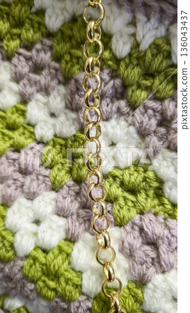 A colorful knitted fabric texture suitable for home decor, fashion, or textile A colorful knitted fabric texture suitable for home decor, fashion, or textile 136043437