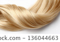 Women's long blonde curl of hair. Beautifully styled wavy shiny curls. Hair coloring. Hairdressing procedures, extension. Blond hair close-up as a background. White hair image 136044663