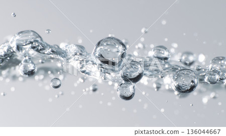 Bubbles and drops of fresh water or hyaluronic acid or liquid. The concept of Pure Drinking clean water Splashing Water Wave. Air Bubbles Float Up Bubbles and drops of fresh water or hyaluronic acid or liquid. The concept of Pure Drinking clean water Splashing Water Wave. Air Bubbles Float Up 136044667