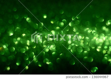 Green bokeh lights abstract background with soft glow and sparkling orbs for visual mood 136044967