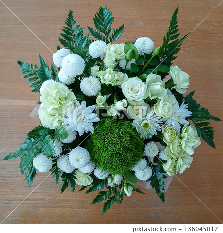 Elegant white and green floral bouquet with roses chrysanthemums and ferns for wedding or gift Elegant white and green floral bouquet with roses chrysanthemums and ferns for wedding or gift 136045017