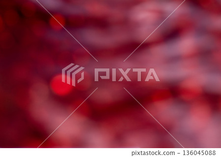 Soft red abstract bokeh background with warm glow, dreamy mood, and romantic atmosphere 136045088