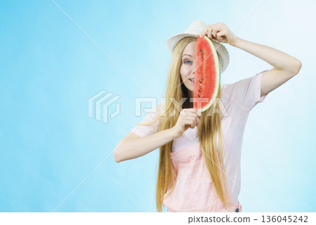 woman holding watermelon fruit woman holding watermelon fruit 136045242