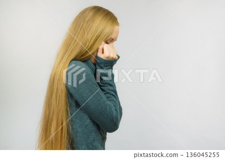 Sad confused young female 136045255