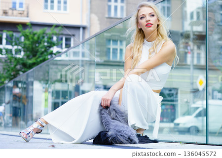 Woman wearing crop top and culottes 136045572
