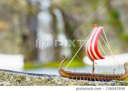 Viking boat on fjord shore, Norway Viking boat on fjord shore, Norway 136045899