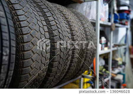 A set of winter tires in the garage A set of winter tires in the garage 136046028