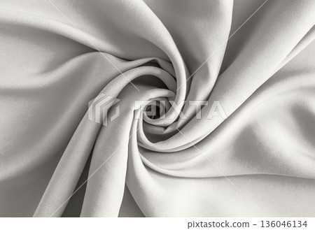 Soft white fabric folds swirl into an elegant drape for a calm minimalist background Demonstration Color of the Year 2026 Soft white fabric folds swirl into an elegant drape for a calm minimalist background Demonstration Color of the Year 2026 136046134