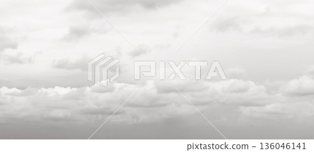 Calm gray sky over distant horizon with soft clouds and wide open space Demonstration Color of the Year 2026 136046141