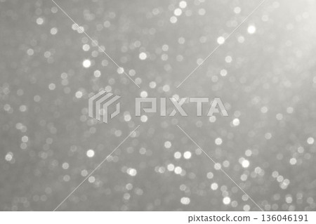Soft gray bokeh backdrop with light orbs creating an elegant abstract sparkle scene Demonstration Color of the Year 2026 136046191