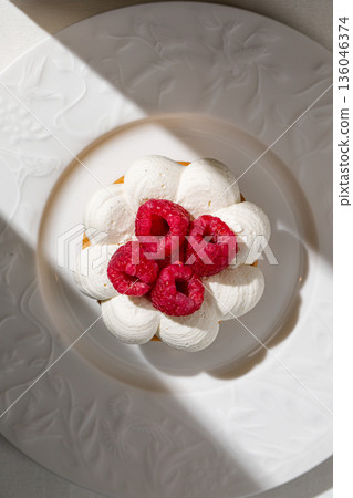 Raspberry dessert tart with whipped cream Raspberry dessert tart with whipped cream 136046374