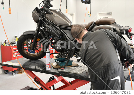 Motorcycle under repair 136047081