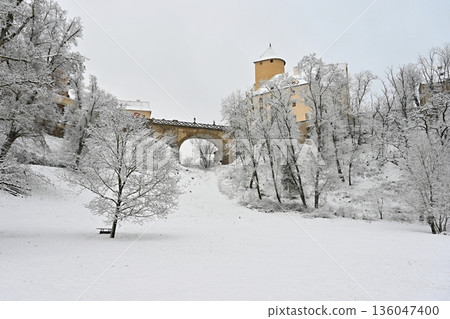 The beautiful old castle of Veveri Brno, Czech Republic. Winter landscape with snow and nature surrounding the castle. The beautiful old castle of Veveri Brno, Czech Republic. Winter landscape with snow and nature surrounding the castle. 136047400