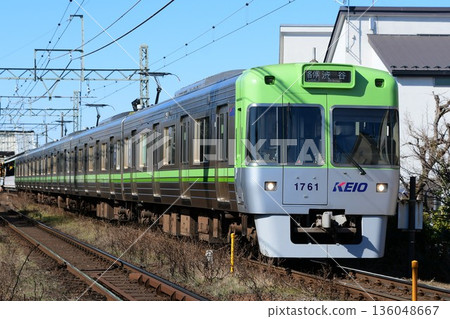 Keio 1000 series 1761F light green train on the Inokashira Line 136048667