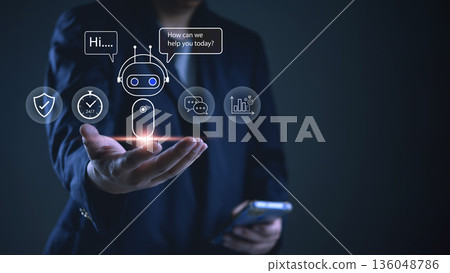 Hand holding hologram bot with speech bubbles for customer service, support ticket, automation, AI assistant, chatbot, messaging, KPI, insights, secure, mobile device, business growth. 136048786