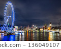 London night view of the River Thames, London Eye Ferris wheel and the Palace of Westminster 136049107