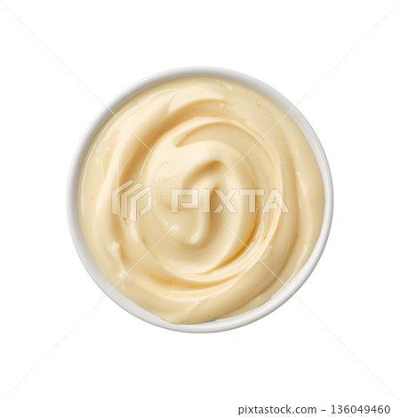 Creamy Sauce Sits in a Small White Bowl on a Plain Background Ready for Use in Meals 136049460