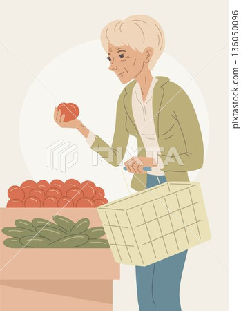 Senior woman choosing fresh vegetables in grocery store 136050096