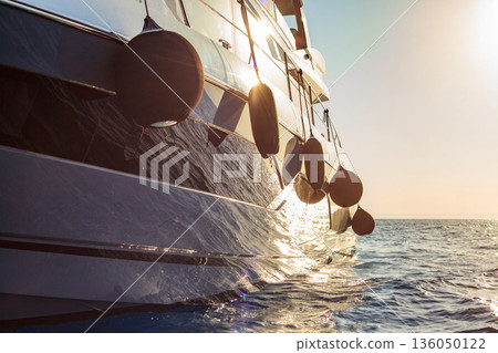 Luxury boat on the sea at sunset Luxury boat on the sea at sunset 136050122