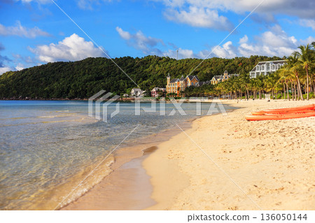 Iceland Phu Quoc Vietnam 5.7.2025. A beach with a clear blue ocean and a few orange kayaks Iceland Phu Quoc Vietnam 5.7.2025. A beach with a clear blue ocean and a few orange kayaks 136050144