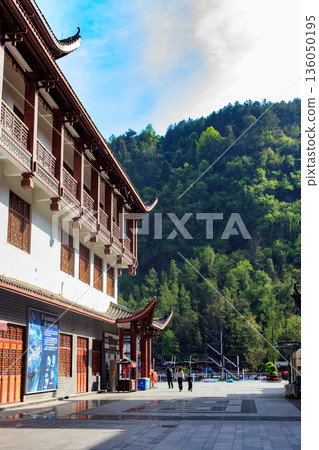 Chongqing China 4.7.2025. Traditional Chinese pagoda tower with curved tiled roofs Chongqing China 4.7.2025. Traditional Chinese pagoda tower with curved tiled roofs 136050195